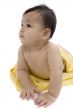 Sweet baby with a yellow blanket
