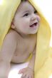 Sweet baby with a yellow blanket