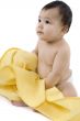 Sweet baby with a yellow blanket