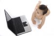 sweet baby with laptop