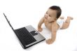 sweet baby with laptop