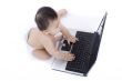 sweet baby with laptop