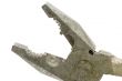 combination pliers on white macro