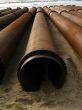 Construction pipes on the seashore