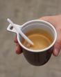 Hand of the girl with a coffee cup