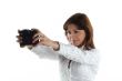 young woman with old camera isolated on white background