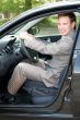 businessman at the wheel