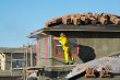 Construction Worker Pressure Washes