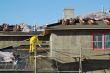 Construction Worker Pressure Washes