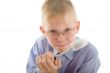 Boy holding brush and prepare to clean everywhere