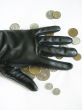 A hand with coins