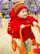 Laughing girl in a red jacket