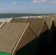 the rooves of beach huts