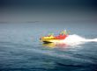 powerboat crossing a wake