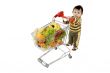 Baby pushes a shopping cart