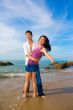 loving young couple hugging each other on the beach