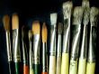 Artistic brushes on a dark background