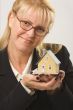 Woman Holding House