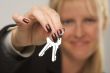 Woman Presenting Keys