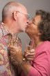 Happy Senior Couple Kissing