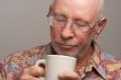 Senior Man Enjoys His Coffee