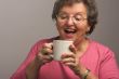Senior Woman Enjoys Her Coffee