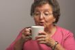 Senior Woman Enjoys Her Coffee