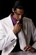 TYoung man with his necktie