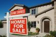 Bank Owned Home For Sale Sign in Front of New House