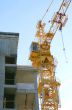 New building under construction with crane