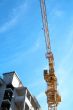 New building under construction with crane