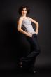 brunette girl posing on dark background