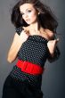 Beautiful  brunette girl posing  on dark background