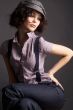 brunette girl posing on dark background