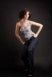 brunette girl posing on dark background