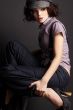 brunette girl posing on dark background