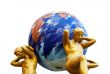 Statues support the globe of the Earth