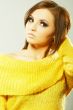 Beautiful woman in yellow sweater
