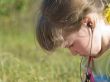 Thinking and listening girl
