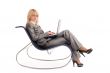 Businesswoman with laptop rest in chair over white