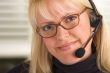 Attractive Businesswoman with Phone Headset