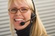 Attractive Businesswoman with Phone Headset