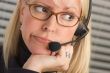 Attractive Businesswoman with Phone Headset