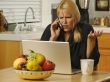 Woman on Cell Phone & Laptop