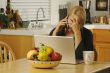Woman on Cell Phone & Laptop