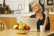 Woman Using Laptop for E-commerce