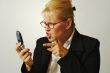 Angry Business Woman on Cell Phone