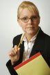 Beautiful Woman Thinks with Pencil & Notepad
