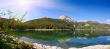 panorama of mountain lake with reflections