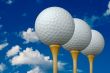 Three Golf Balls & Tees